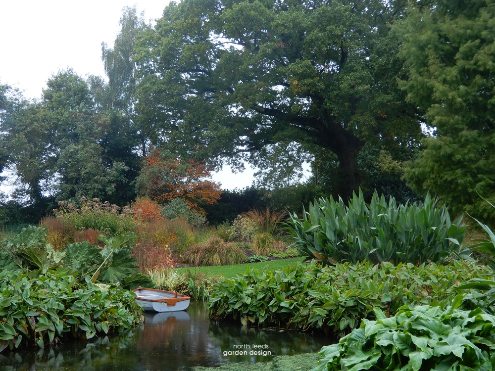 Beth Chatto water garden with rowing boat